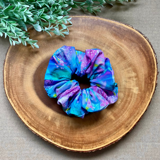 Cotton scrunchie from Bully Love Boutique's Wishmaler collection, soft white fabric with gentle elastic for hair styling.
