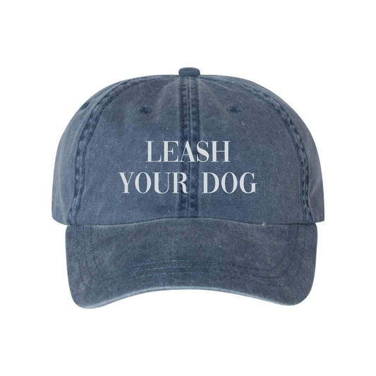 Bully Love Boutique leash your dog hat featuring bold text and playful design in black and white with a comfortable fit.