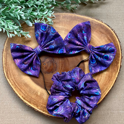 Peacock-colored cotton scrunchie from Bully Love Boutique with a soft, stretchy fabric and ruffled design.