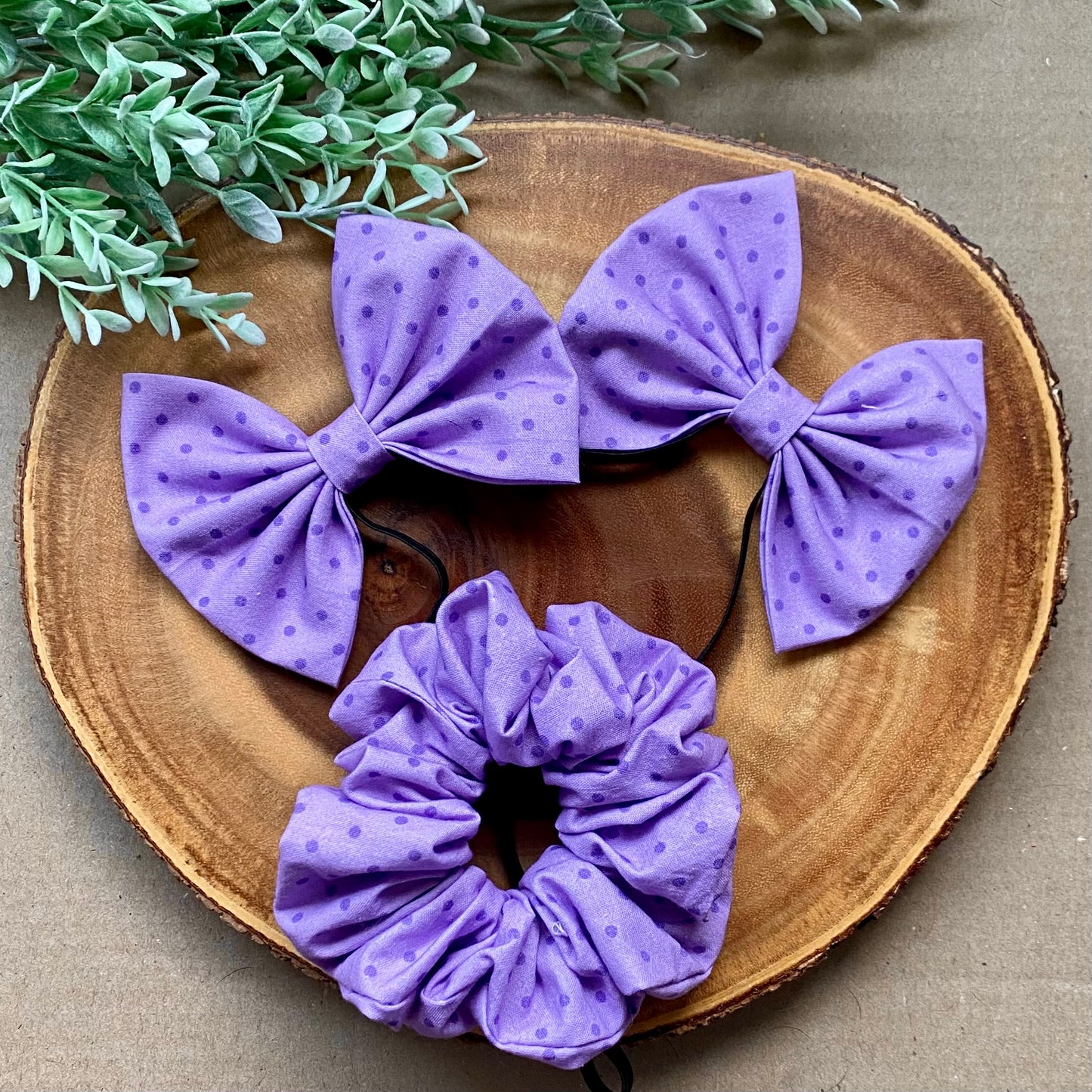 Purple Love Cotton Scrunchie from Bully Love Boutique showing soft fabric and elastic band for hair styling.