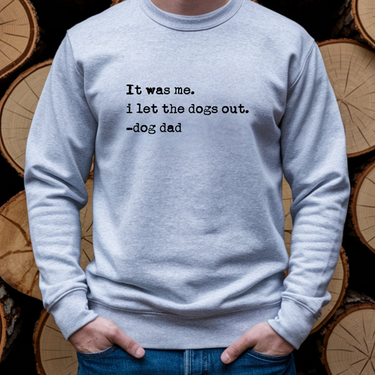 Grey "I Let the Dogs Out" crewneck sweatshirt by Bully Love Boutique, featuring a comfortable fit and dog-themed graphic design.